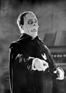 6.3K views · 286 reactions | A century of The Phantom of The Opera, a film which bridged the gap between the ‘melodrama’ of the silent period and the ‘horror’ of the sound era. Lon Chaney's exceptional makeup and prosthetic skills were kept under wraps as actress Mary Philbin, who played Christine Daaé, hadn’t seen Chaney in full makeup prior to filming this unmasking scene, and her terror on screen was genuine.  | Housecore Horror Film Festival | Facebook