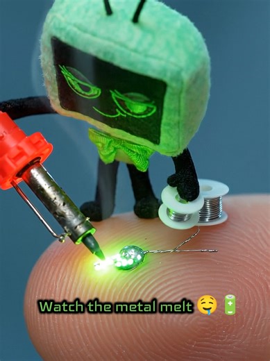Vee is taking custom nails and finger tattoos to a whole new level with this microchip install. 🔋💅 The sound of that microscopic soldering iron melting the wire is pure brain-tingling ASMR. Turn your volume up and watch the chip glow! ✨ What character should build on appendages next? 👇#DandysWorld #SolderingASMR #MicroArt #ASMR #OddlySatisfying