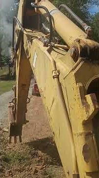 running John Deere 410 backhoe first time grading with backhoe