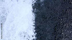Ocean Waves Crashing Against Hexagonal Basalt Rock Formation at Giant's Causeway