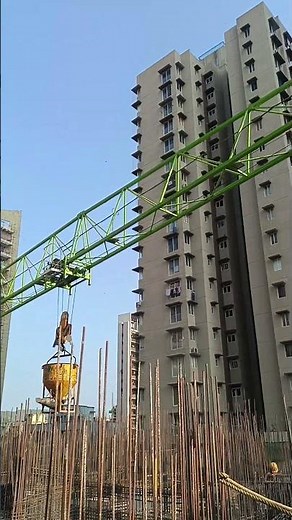 Tower Crane operation for concrete work. Tower crane work. Concrete work.