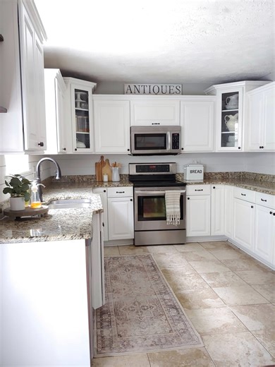 22K views · 422 reactions | Kitchen counter styling ✨️ Comment kitchen for details to send to your inbox. I love these bottles for my oils and the little marble tray! Such a cute addition for aesthetic kitchen organization. • #kitchendecor #kitchenorganization #cleaninghacks • Spring decor | kitchen design | organized home | neutral home| affordable decor | cozy home | Fallons.homestead | Facebook