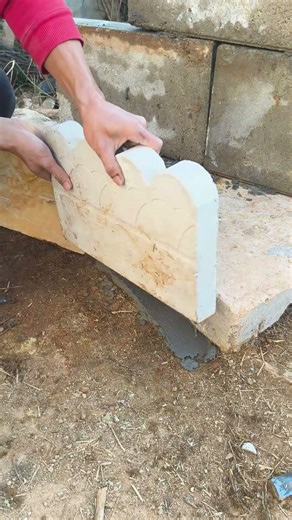 Pavement curb installation for flower beds