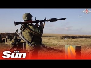 Russian conscripts fire rockets and rifles during military training in Rostov