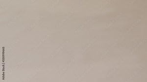 Roll of drawing paper being unrolled and placed on table. Perfect for drawing, sketching or colouring - this drawing paper has a multitude of uses and can be used for preparing posters, drawing sketch