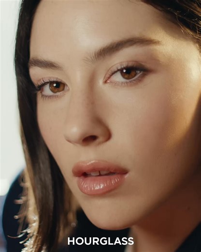 Introducing our new global brand partner, Gracie Abrams. Achieve the singer-songwriter's glow with two of her Hourglass favorites. Gracie Abrams wears Veil Hydrating Skin Tint in shade 4 and Vanish Airbrush Concealer in Crème. | Hourglass Cosmetics | Facebook