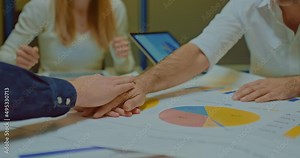Colleagues of the company put hand on hand together, a unifying gesture before starting work. Team building in the company, successful people in the company. Close-up. 4k, ProRes