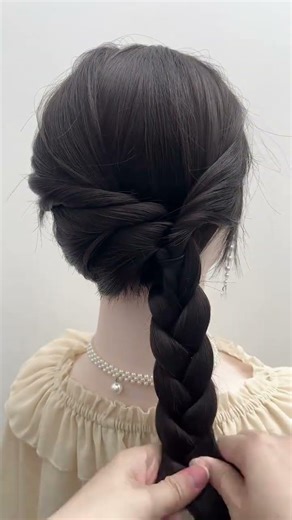 Spring-Inspired Side Bun for a Gentle and Elegant Look