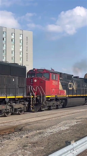 IC SD70 and C44-9WL power CN E251 north #locomotive #train #railroad #railway #city #cargo