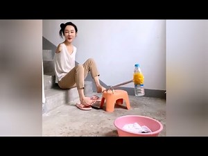 Girl With No Arms Attending to Daily House Chores | DAE Amputee Woman