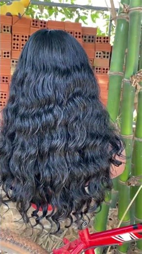 Natural wavy b or loose curly. Medium luster