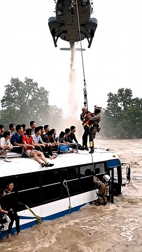 3.1M views · 4.8K reactions | Helicopter Rescues Dozens From Submerged Bus in Deadly Floods | World Disaster | Facebook