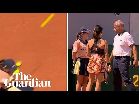 French Open: doubles pair disqualified after stray shot leaves ball girl in tears