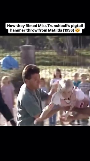 FilmFreeway on Instagram: "😱 The iconic pigtail scene in Matilda (1996) was created using practical effects, a mechanical rig, and a little CGI. Jacqueline Steiger (Amanda Thripp) was secured in a harness and attached to a rig for the spinning sequences, while Pam Ferris (Miss Trunchbull) mimed swinging fake pigtails. The crew had a code word, “jelly beans,” for Steiger to use if she felt dizzy during filming. 🎥: @cineatomy #matilda #matildathemusical #cinema #cinephile #behindthescenes #filmm