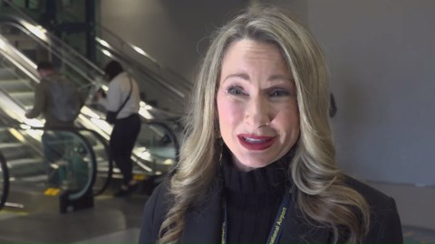 Airport concourse connector opens