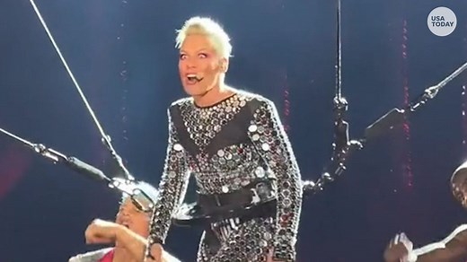 Singer Pink does daring stunt over crowd during concert