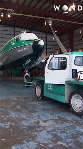 A ray of light for Buffalo: the DC-4 is finally ready to join the river shuttle! With its 20,000-pound capacity, it's crucial for clearing the backlog. Mechanics worked hard to install the required TCAS technology, but time was tight. #BuffaloTransport #RiverShuttle #DC4 #Logistics #NorthernSupply | The Wonder Channel