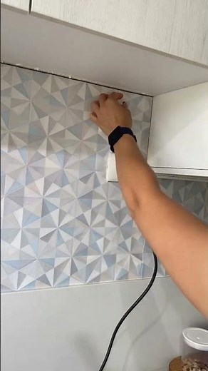 Installing the New Air Purifier in the Kitchen | Carla Oliveira