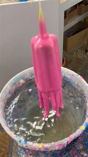 The satisfying candle dipping process up close