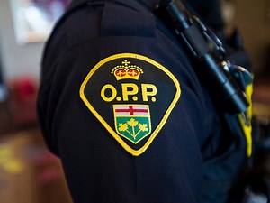 OPP clarify reasons for Friday's emergency alert and say two men remain at large, but on unrelated charges