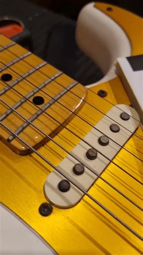 Squier Classic Vibe Stratocaster '57 Reissue Vintage White: The Sound and Look of Fender's Golden...