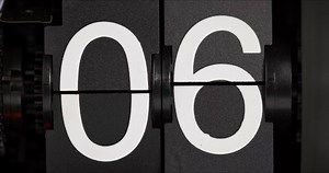 clip-1089645195-close-flip-clock-tells-seconds-06-07