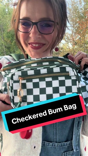 The Checkered Bum Bag is a stylish and versatile accessory perfect for any outing. With its crossbody design, it offers comfort and easy access while keeping your hands free. The roomy interior is great for storing essentials, and it features a card slot along with multiple pockets, ensuring you stay organized on the go. Whether you're heading to a festival, running errands, or just exploring the city, this bum bag combines functionality with a trendy look. #checkered #CrossbodyBag #beltbag #Sty