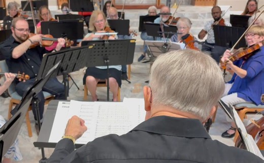 Community orchestra rehearses Oscars show