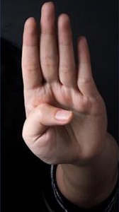 Store worker recognizes domestic abuse victim's hand signal, calls for help