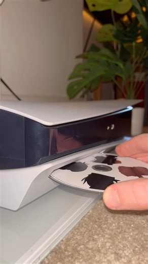 What happens when you put a CD in a PlayStation 5?