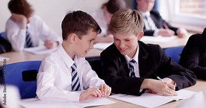 4k, Two classmates chatting in the classroom. Slow motion.