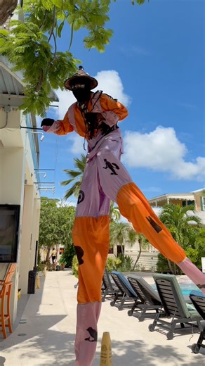 Di you know that Moko Jumbies are tall, vibrant guardians of St. Croix?! Walking high above the crowd, they symbolize protection, strength, and the island's enduring spirit and culture. #stcroix #vacation #caribbean #tropical #mokojumbie #cruiseship #usvi #virginislands | The Fred
