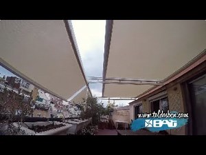 Toldos verandas Giotto de Bat, motorizados con Somfy IO y tejido Soltis96