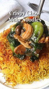 Crispy Chow Mein Noodles. Crispy fried noodles in a savoury gravy with tender chicken, bouncy shrimp and vegetables. So delicious and ready in 30 minutes. Recipe link: https://christieathome.com/blog/crispy-chow-mein-noodles | Christie at Home
