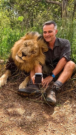 Taking a selfie with a lion