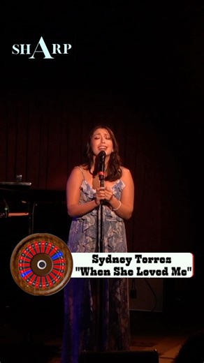 Sydney Torres singing “When She Loved Me” at Rep Book Roulette
