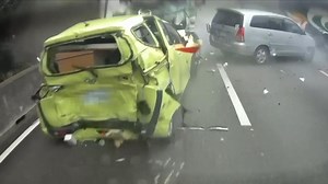 Footage shows the dramatic moment 10 cars were involved in a pile-up in major highway crash in Taiwan.