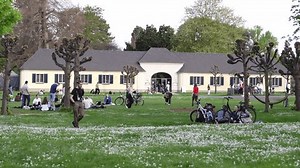 central entrance to botanical garden bonn germany europe. spring people relaxing on lawn in park. april 12 2024. Bonn .Germany
