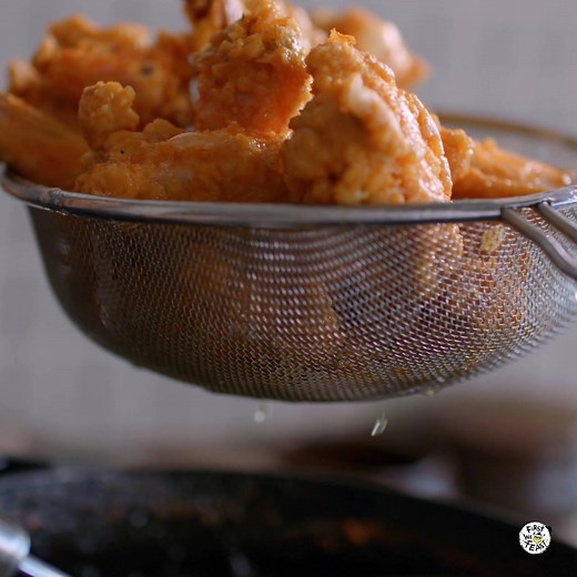 Maangchi teaches Sean how to make Korean spicy fried chicken wings. | First We Feast