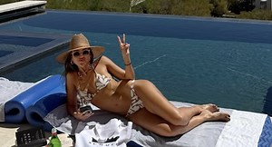 Jessica Alba Drops Bikini Pics After Being Spotted Kissing a "Mystery Man"