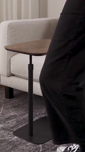 Our new Hopper adjustable height c-table makes it easy to work from the comfort of your favorite chair. https://cur.lt/br87gicrk | Room & Board