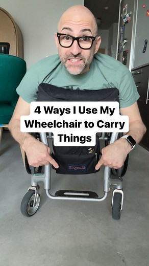 4 Ways I Use My Wheelchair to Carry Things Video description: in this video, Spencer physically shows four different ways he uses his wheelchair to carry things. The first, he hangs a backpack off the back of his wheelchair. Fun fact the Jansport bag he’s hanging is specifically designed for wheelchair users. The second is his cushion, which is always longer than his actual body so he can use it to carry stuff on his lap or lack there of. The second is the foot rest, if he had feet, they would r