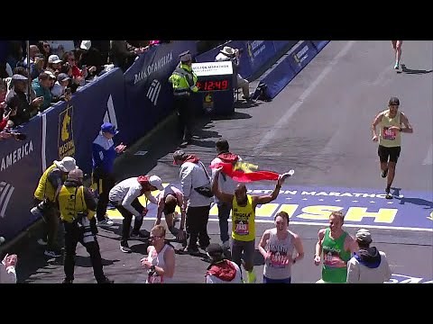 Boston Marathon runner crawls across finish line after collapsing on Boylston Street