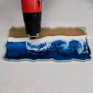 939K views · 7.1K reactions | In this video, I'll show you how to make a gorgeous resin beach tray with real sand and shells and foamy waves :) | Mixed Media Girl | Facebook