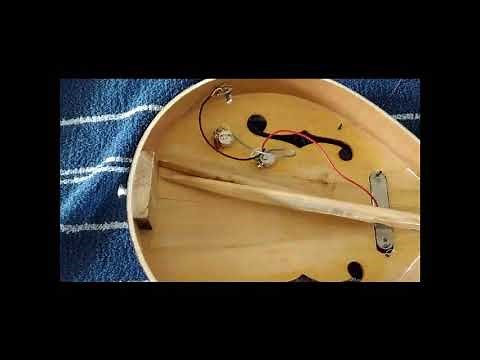 Mandolin with sinked top repair