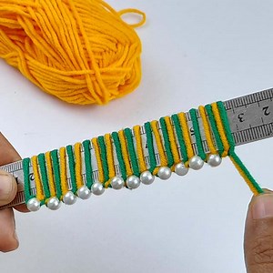 193K views · 1.1K reactions | Perfect Woolen Flower Making With Scale | Woolen Embroidery Ideas | DIY Flower | Rana Craft | Facebook