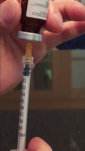 Demonstration for patient: drawing of medication and eliminating air space in vial.