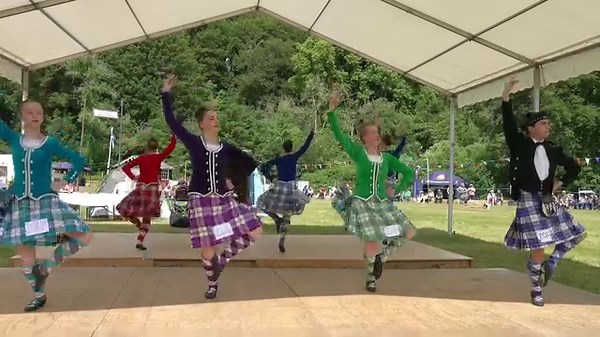Competitors in the Highland Fling, Scottish Highland dancing adult heats during the 2023 Drumtochty Highland Games. These were held in the grounds of Drumtochty Castle at Auchenblae in Aberdeenshire, Scotland, on Saturday 24th June 2023. Competitors included Libby May (No. 242) and the male taking part on the right here is Hamish McInnes, an adult Highland Dancing Champion from Brisbane in Queensland, Australia. #Drumtochty #highlandgames #aberdeenshire #highlanddance #highlanddancing #HighlandF