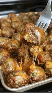Cheesy Baked Beef Meatballs Sometimes the simplest dishes are the ones that bring the most comfort. These cheesy, tender meatballs feel like the kind of recipe you could make on a busy weeknight, yet still remind you of those cozy family dinners from years gone by. What You'll Need Ground beef Cheddar or Colby Jack cheese, shredded Bell pepper, finely diced Fresh parsley, chopped Eggs Breadcrumbs Onion, finely diced Garlic, minced Salt Black pepper Paprika Worcestershire sauce How to Make It Pre