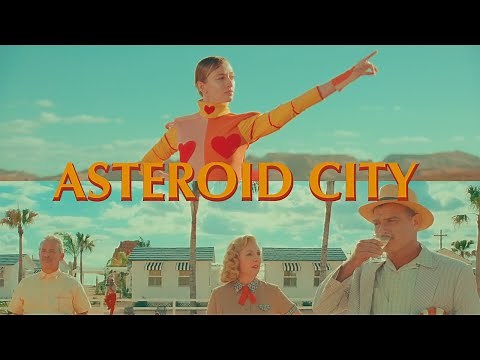 Replicate Wes Anderson color palette in the color grade.